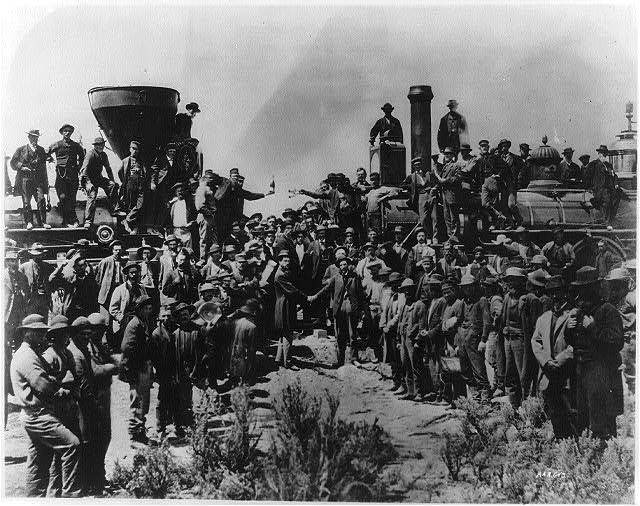 East and West shaking hands at the laying of the last rail at Promontory Summit